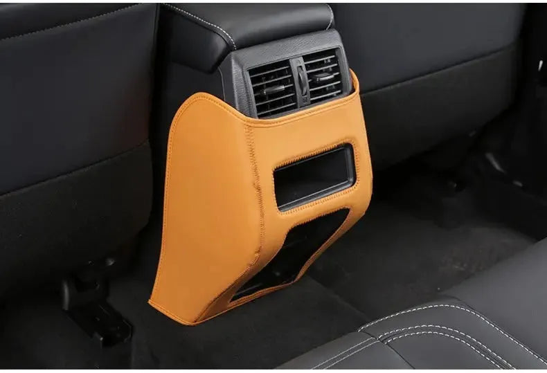 Set of three leather anti-kick pads for 2023 Outlander seat armrest and door card protection.