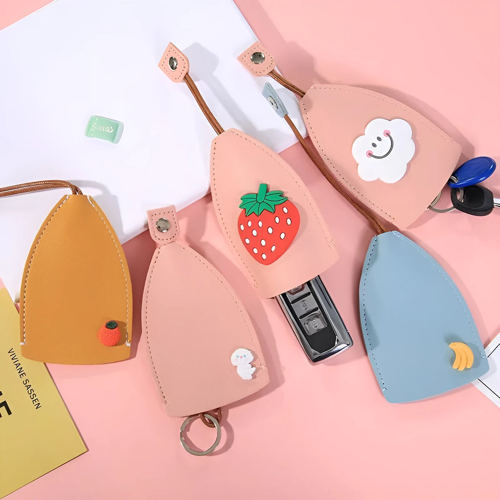Cartoon pull-out car key case in PU leather with various design options including cactus, rabbit, and fruit themes