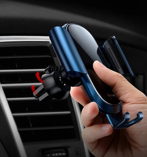 Universal smart car bracket holding smartphone, showing adjustable gripping arms in silvery metallic finish