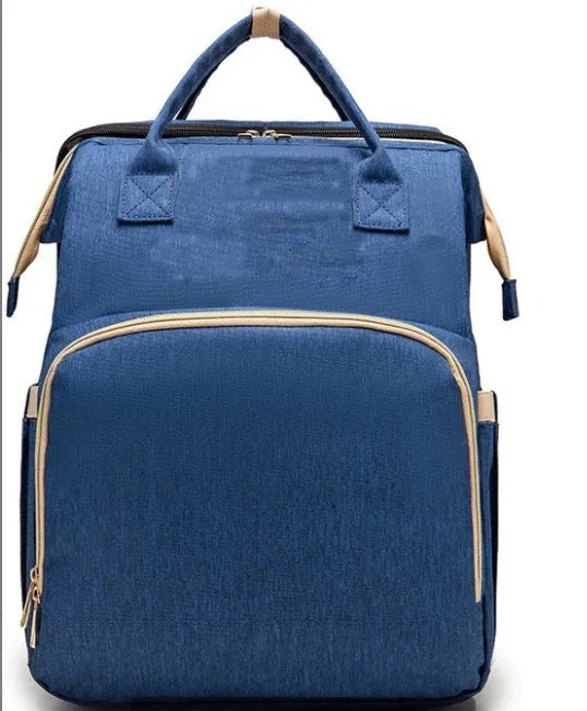 Folding baby bag bed backpack with portable mattress, USB charging option, front pocket, and multiple colour choices