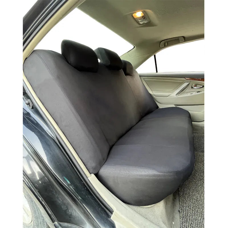 Polyester universal car seat cover with eyelet stitching in blue, showing sponge backing and dimensions.