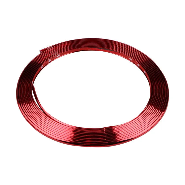 Galvanised purple PVC wheel hub trim on car wheel showing decorative application