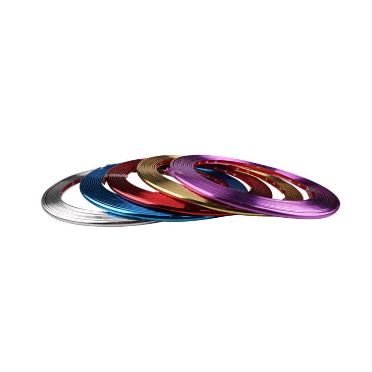 Galvanised purple PVC wheel hub trim on car wheel showing decorative application