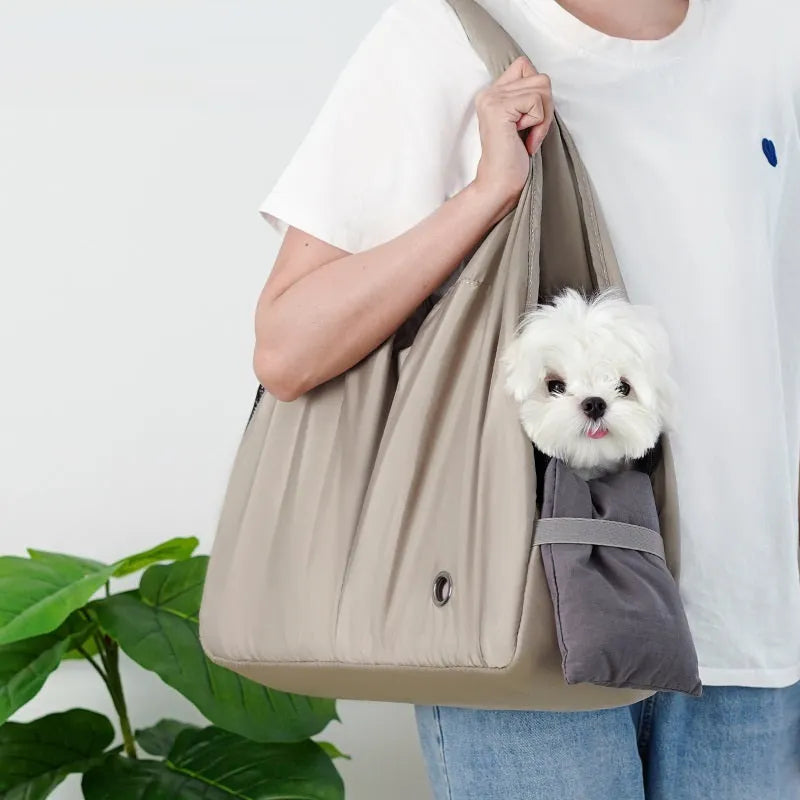 Apricot-coloured cloth pet handbag for small dogs and cats showing dimensions of 41cm by 16cm by 28cm