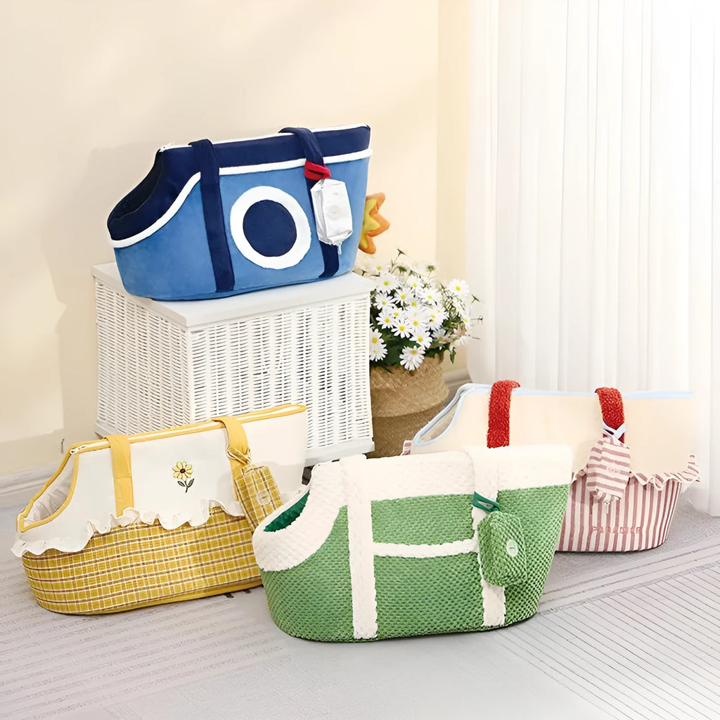 Shoulder cat bag in short plush with cartoon pattern, shown in green, red vertical stripes, or yellow and sunny colour options.