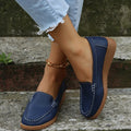 Women's flat loafer shoe in PU leather with car suture stitching on the upper