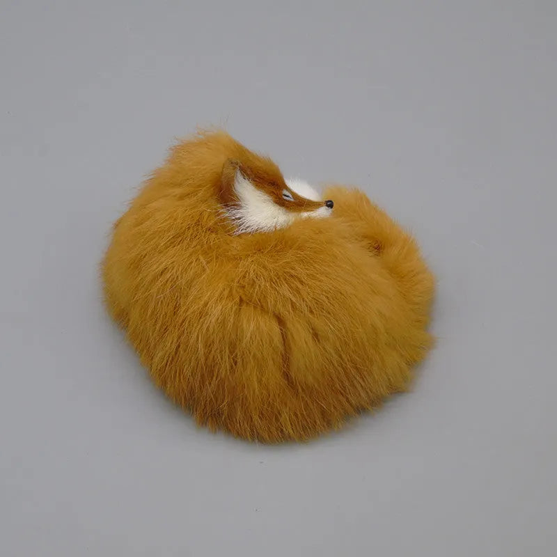 Artificial fox fur car decoration in white, yellow and red colours measuring 15cm