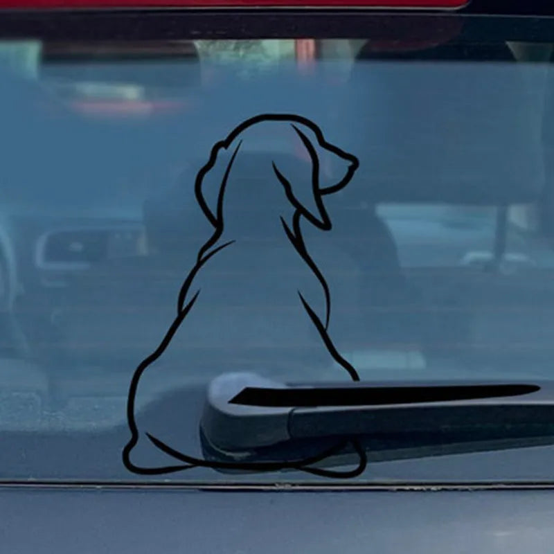 Cartoon wiper back dog car sticker shown on vehicle window with waving tail design