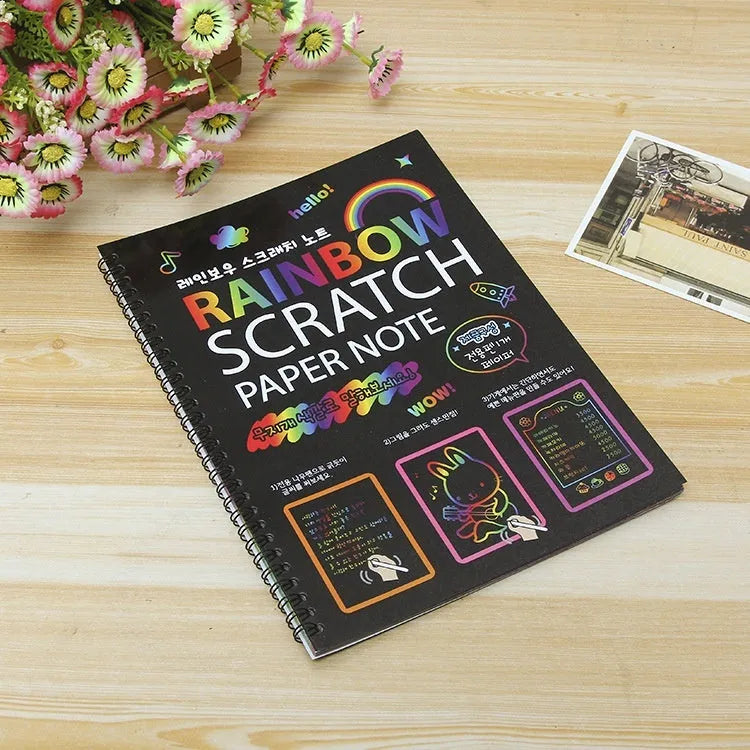 Children's large scratch art paper with colourful puzzle design revealed through scraping technique