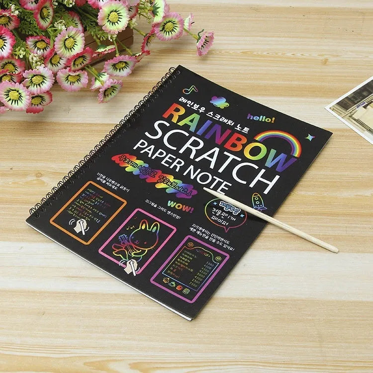 Children's large scratch art paper with colourful puzzle design revealed through scraping technique