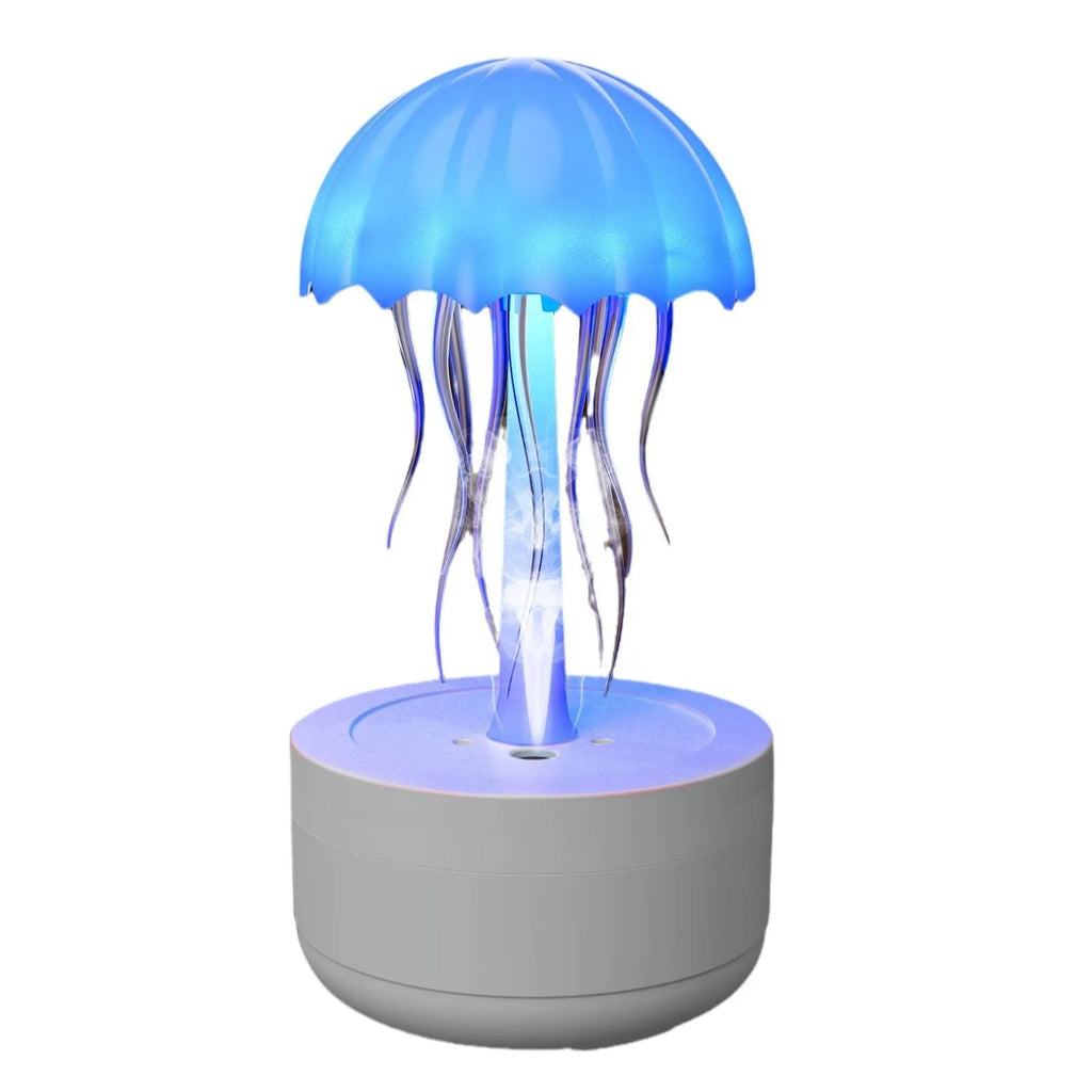 White jellyfish-shaped humidifier and essential oil diffuser with colourful night light on a desk.