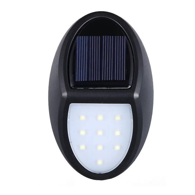 Black solar-powered LED wall light with motion sensor for outdoor security and garden lighting