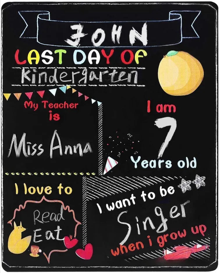 Wooden first day of school blackboard sign on a simple background.