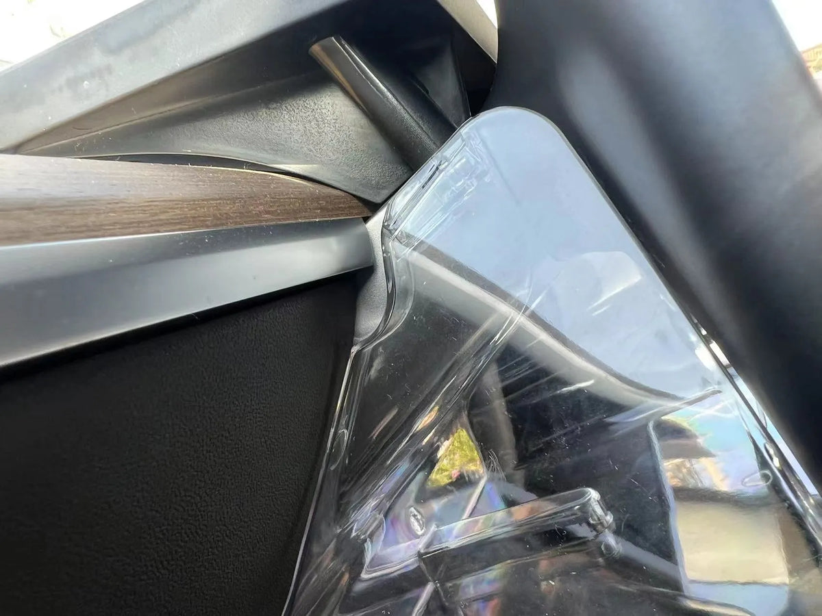 Black ABS storage box for Tesla Model 3 and Y, positioned under the centre touchscreen.