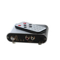 Silver aluminium audio source switch unit with front-panel buttons and infrared remote control.
