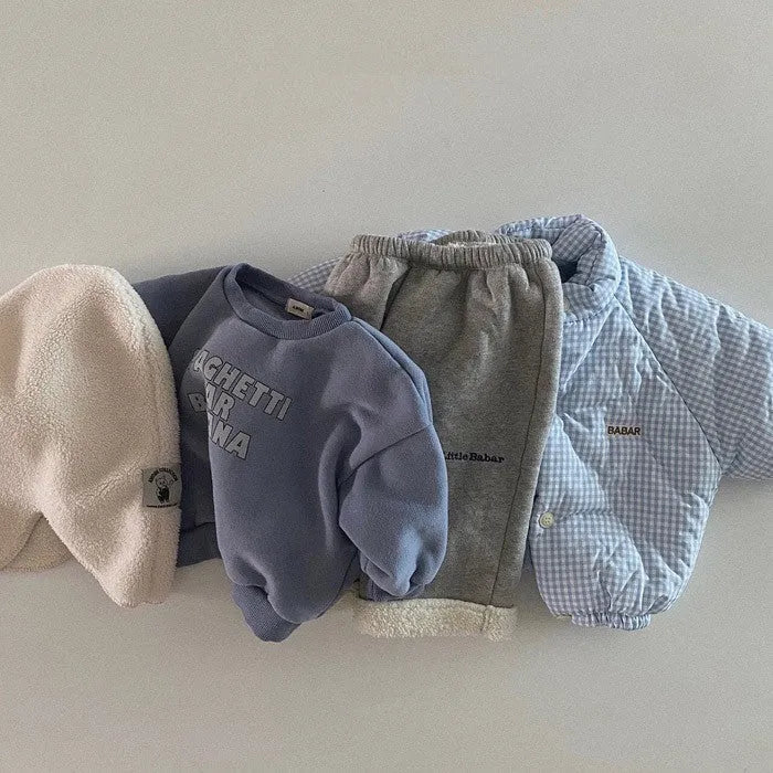 Children's blue long-sleeved cotton letter sweater on child front view