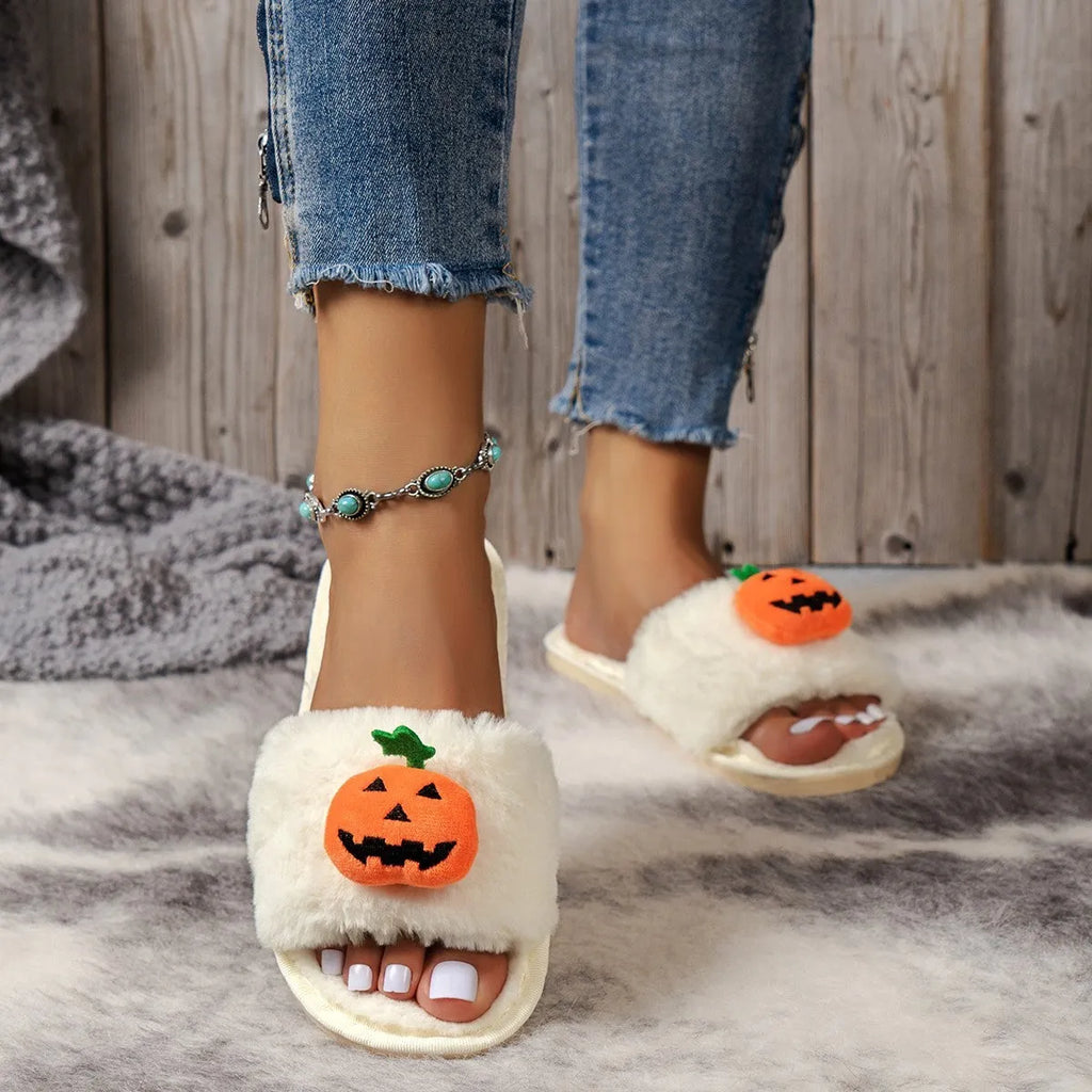White and yellow Halloween pumpkin plush open toe slippers with synthetic fur and PVC sole.