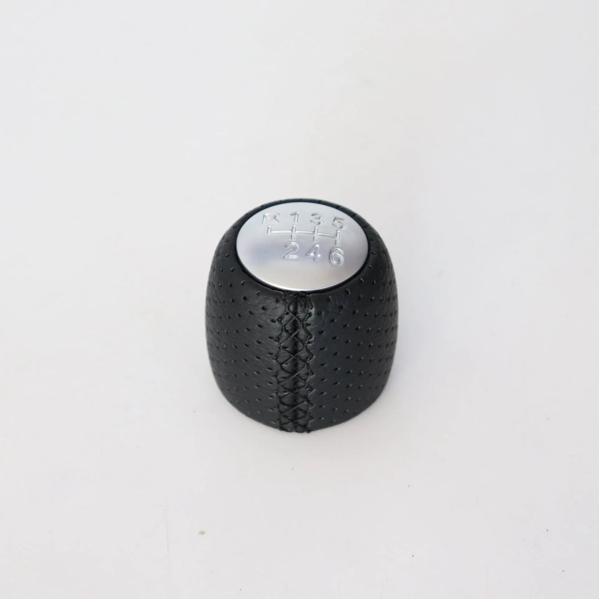 Sewn wrapped perforated leather gear lever handball for Alpha car in black, red, and white line options.
