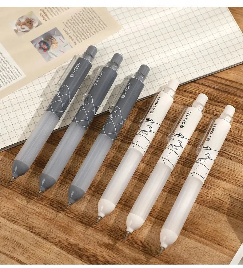 Black and white 0.5mm mechanical pencils with cloud grip on a minimalist background.
