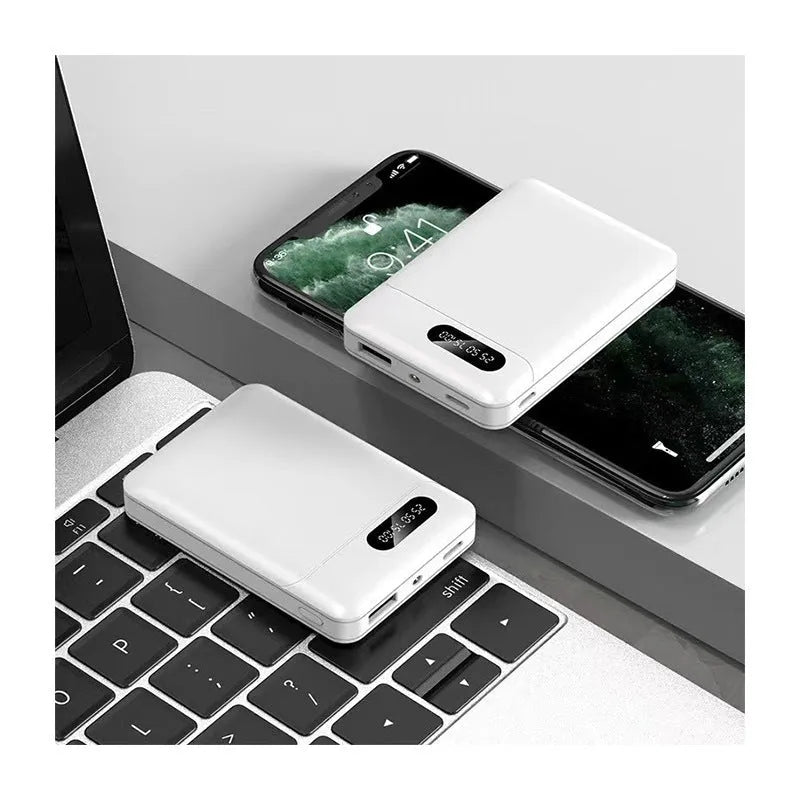 White and black portable power bank showing multiple USB ports and compact 92x63x23mm dimensions