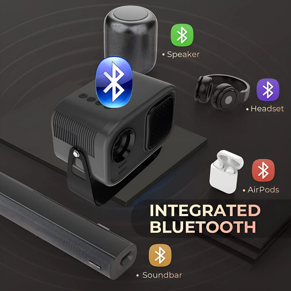 Black portable smart projector with remote control on table
