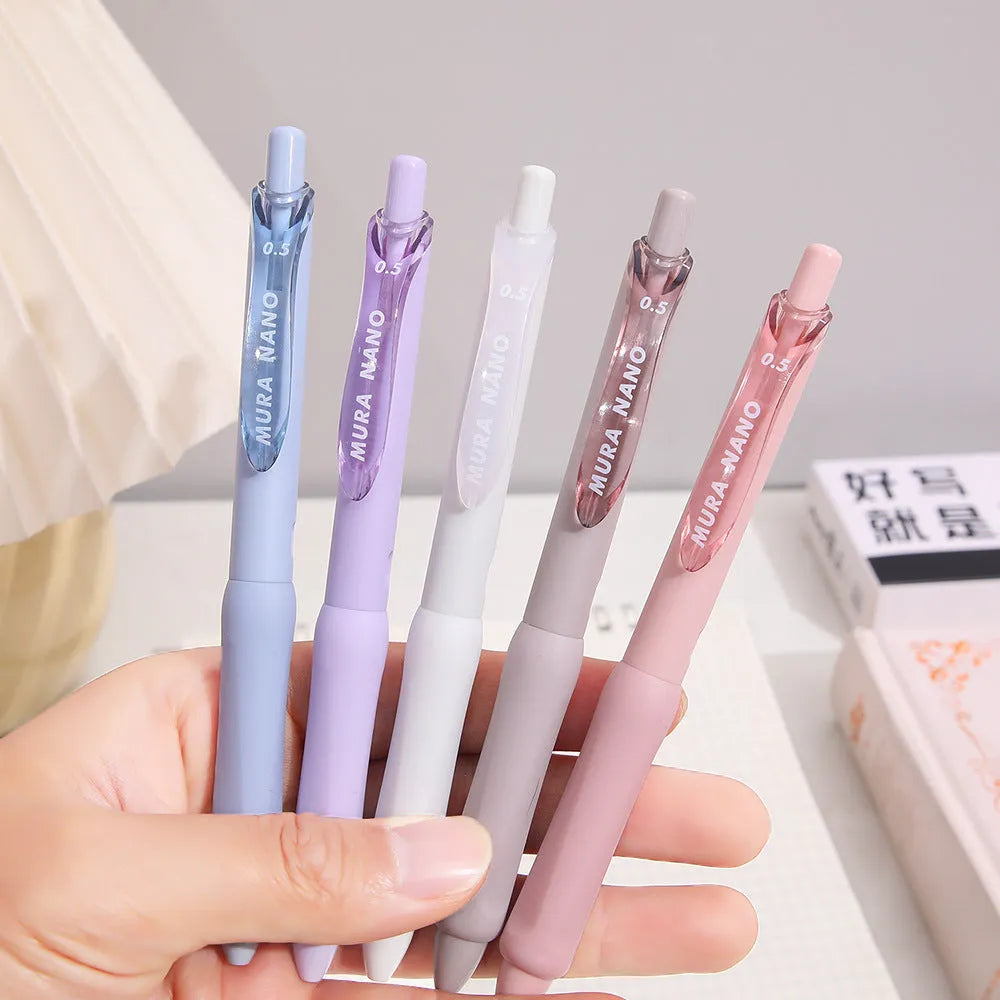 Macaron series press gel pen with 0.5mm tip in smoked brown, white, or powder colour.