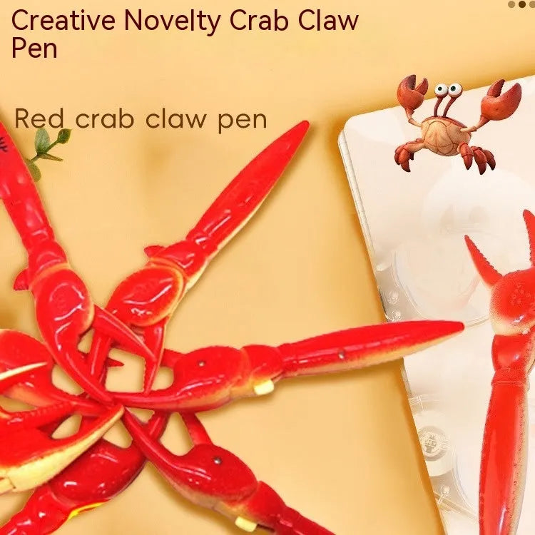 Close-up of a ballpoint pen with a red crab-shaped clip featuring a pressable can mechanism.