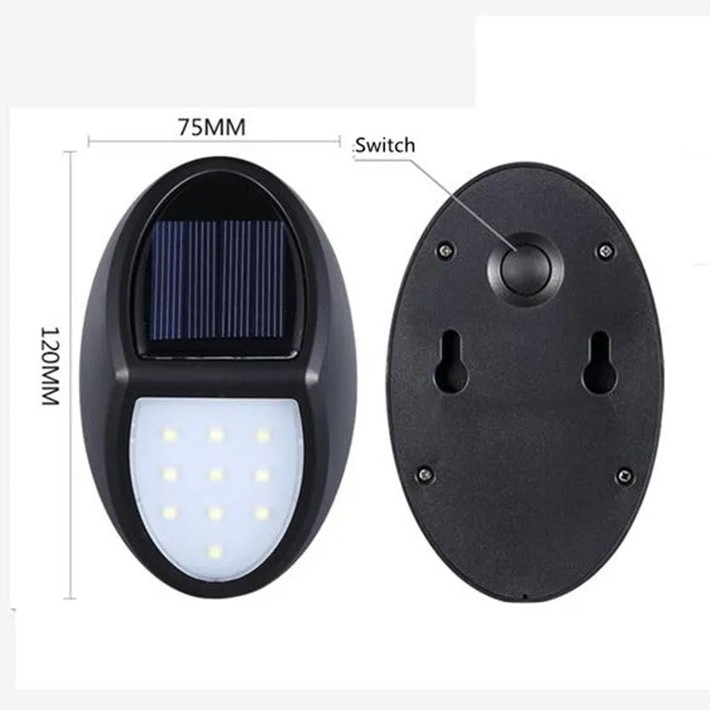 Black solar-powered LED wall light with motion sensor for outdoor security and garden lighting