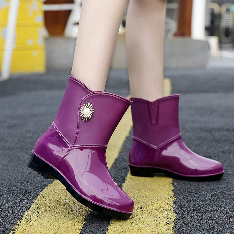 Women's purple PVC fashion rain boots with non-slip sole and low tube socks design