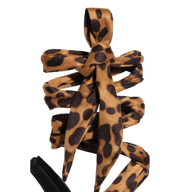Light brown leopard print women's high heels with Roman style cross straps and fine heel