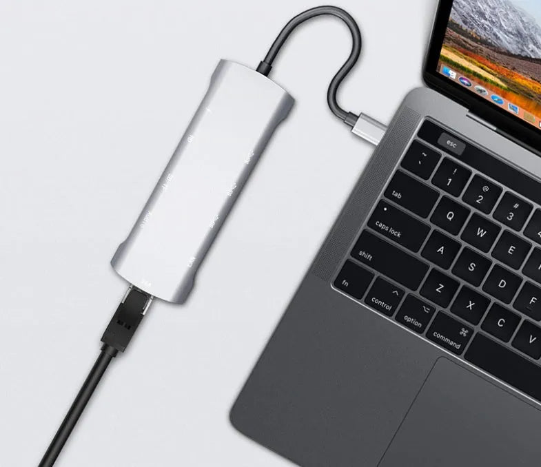 Grey aluminium USB-C docking station with HDMI, VGA and USB ports