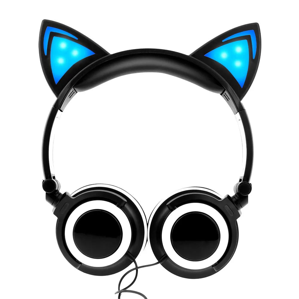 Colourful LED light up cat ear headphones with illuminated ears and cushions on a black background.