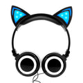 Colourful LED light up cat ear headphones with illuminated ears and cushions on a black background.