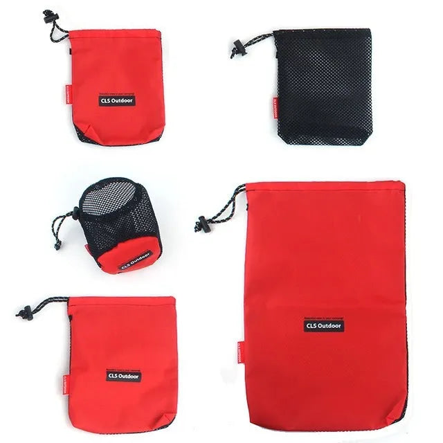 Set of five red Oxford cloth travel storage bags with mesh panels and zippers