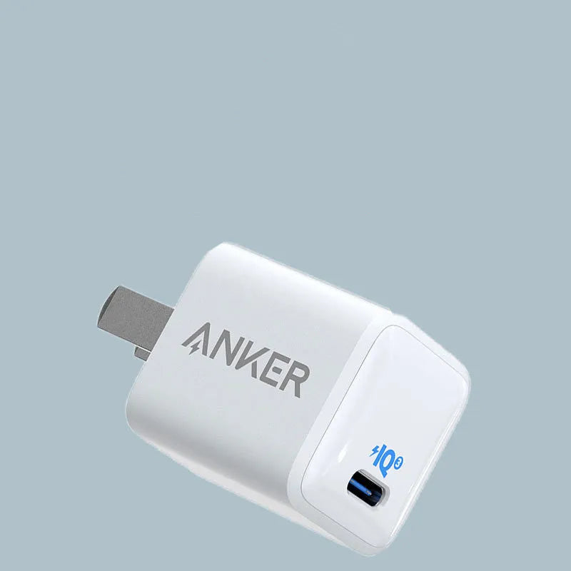 White 18W USB travel phone charger with compact design and standard USB port