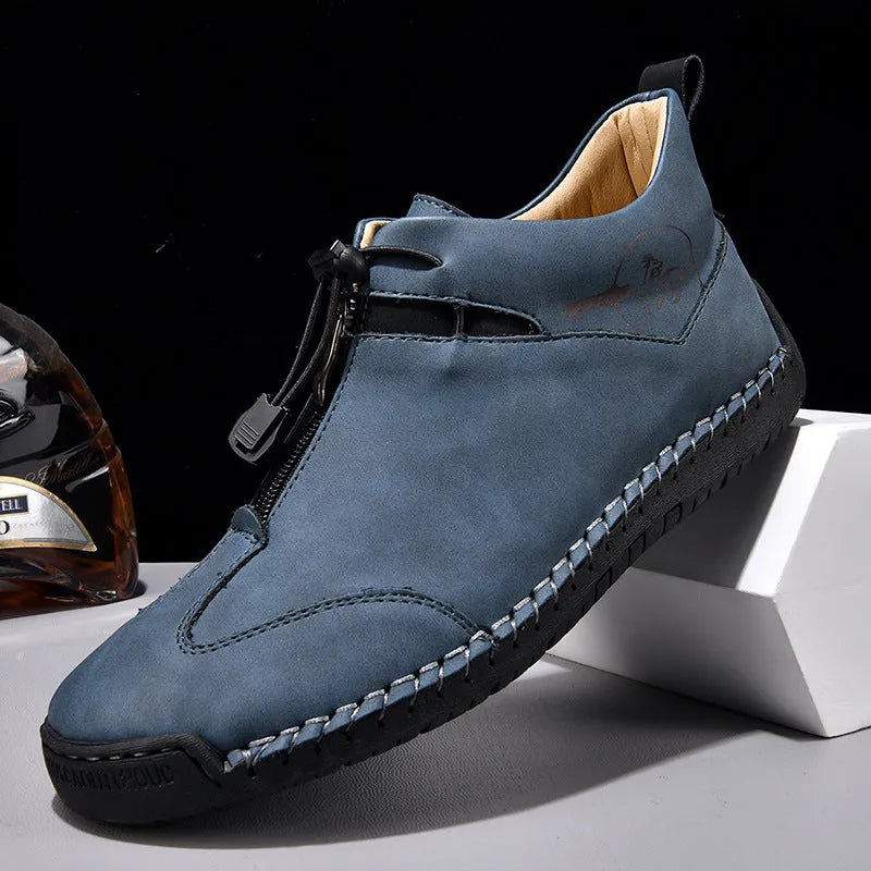 Men's black casual leather shoes with round toe, tall crown, and rubber sole.