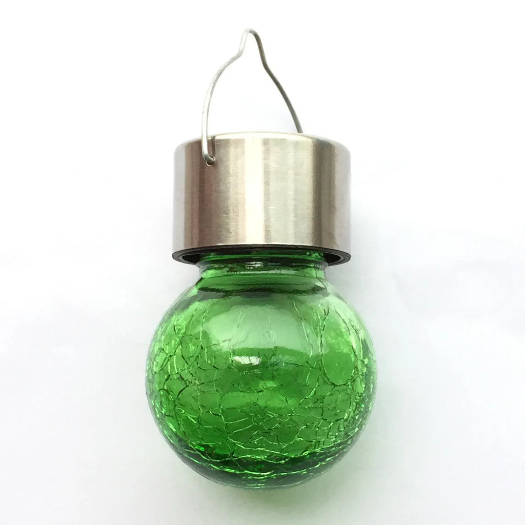Solar cracked glass pendant light with rubber body and LED glow in garden setting