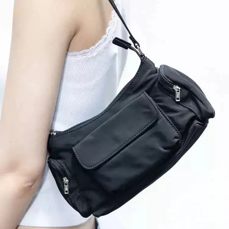 Black PU leather women's shoulder bag with double pockets and side line detailing