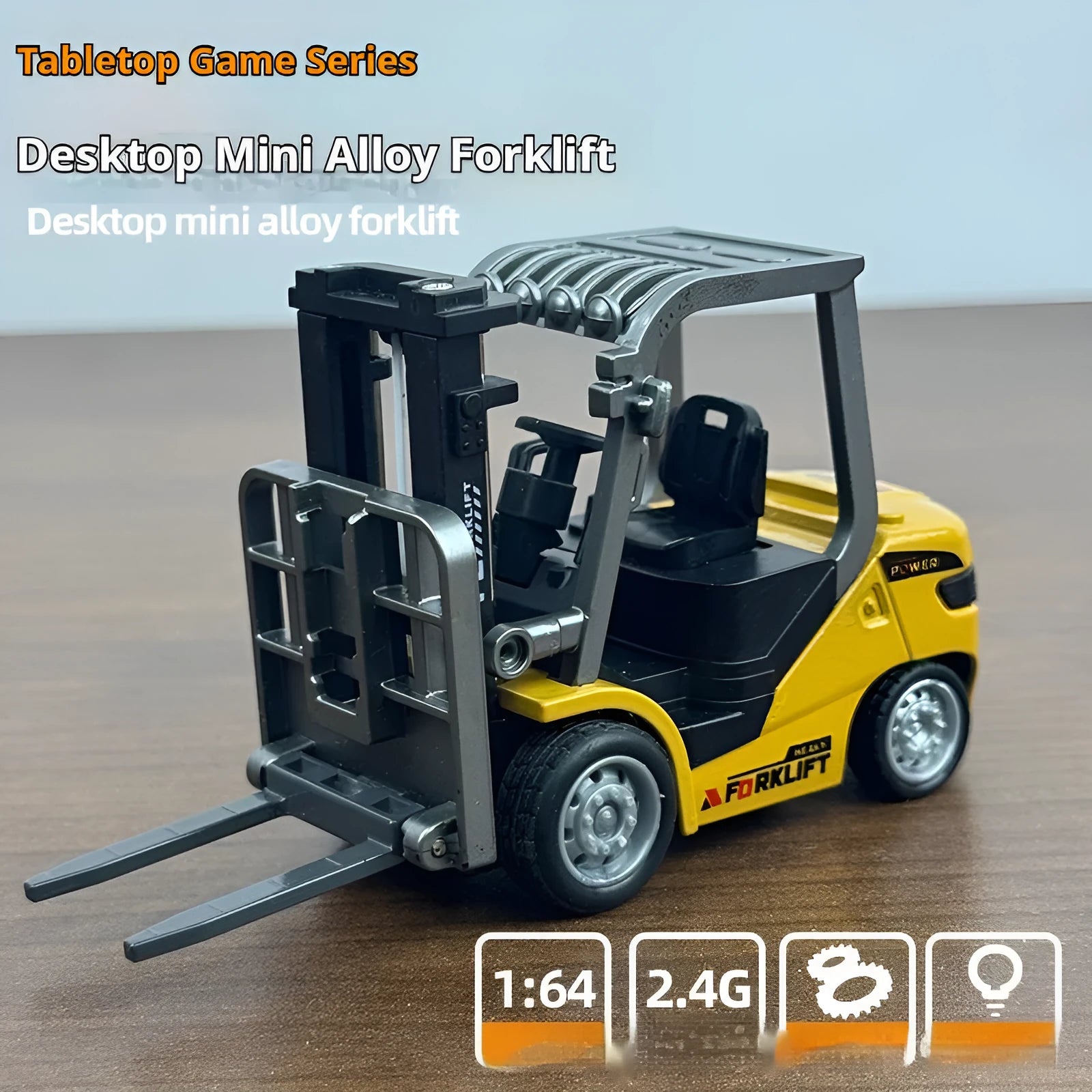 Remote control miniature alloy forklift on desk with remote control unit