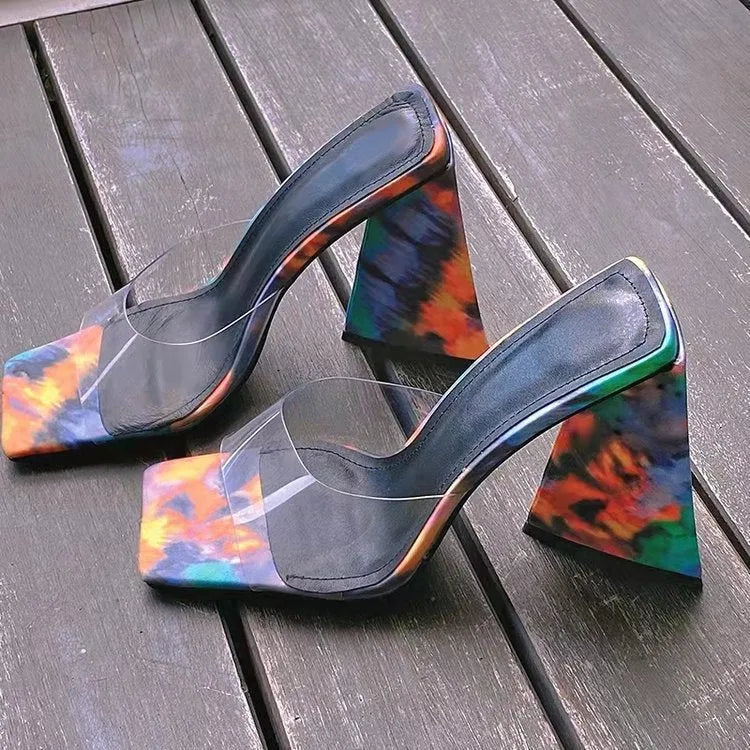 Women's black square-toe slippers with a thick triangular high heel and rubber sole