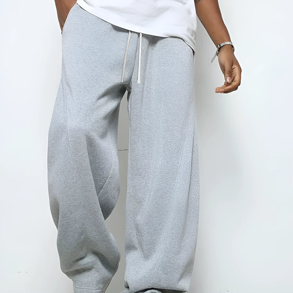 Men's straight-leg casual trousers in black with micro-elastic waistband and drawstring closure