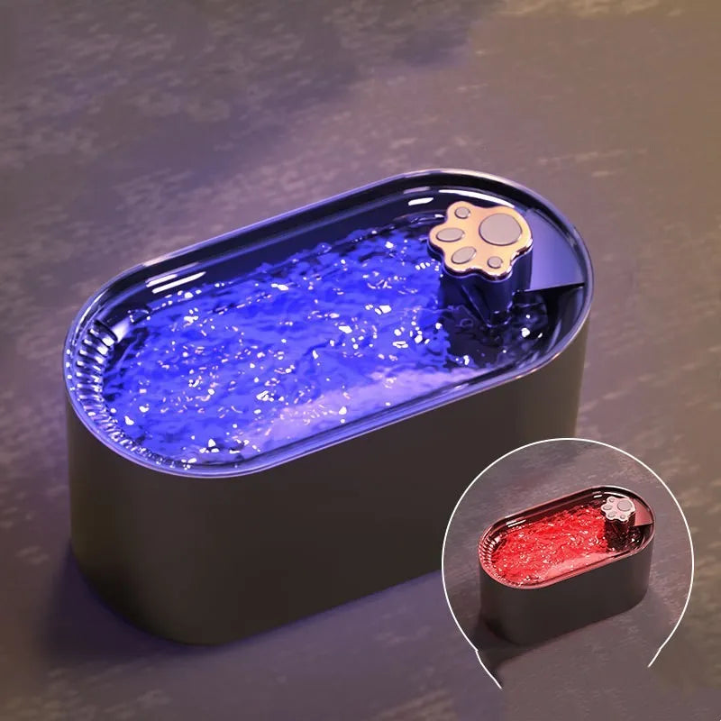 Berlin blue automatic pet water fountain with filter on a kitchen floor.