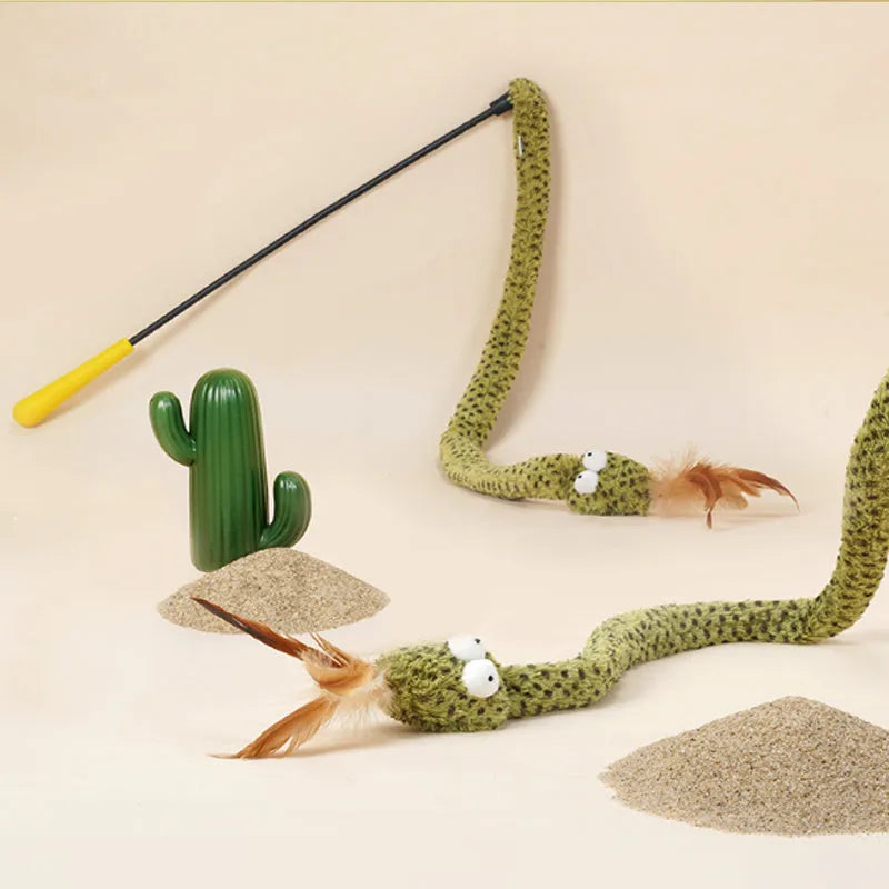 Green snake cat teasing stick with feather attachment measuring 140cm long