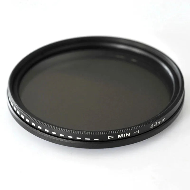 Set of circular camera lens filters in multiple sizes including ND-2, ND-4, ND-8, and ND-400 neutral density filters.