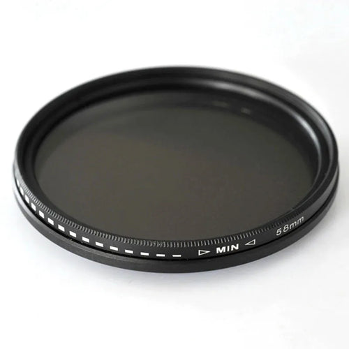 Set of circular camera lens filters in multiple sizes including ND-2, ND-4, ND-8, and ND-400 neutral density filters.
