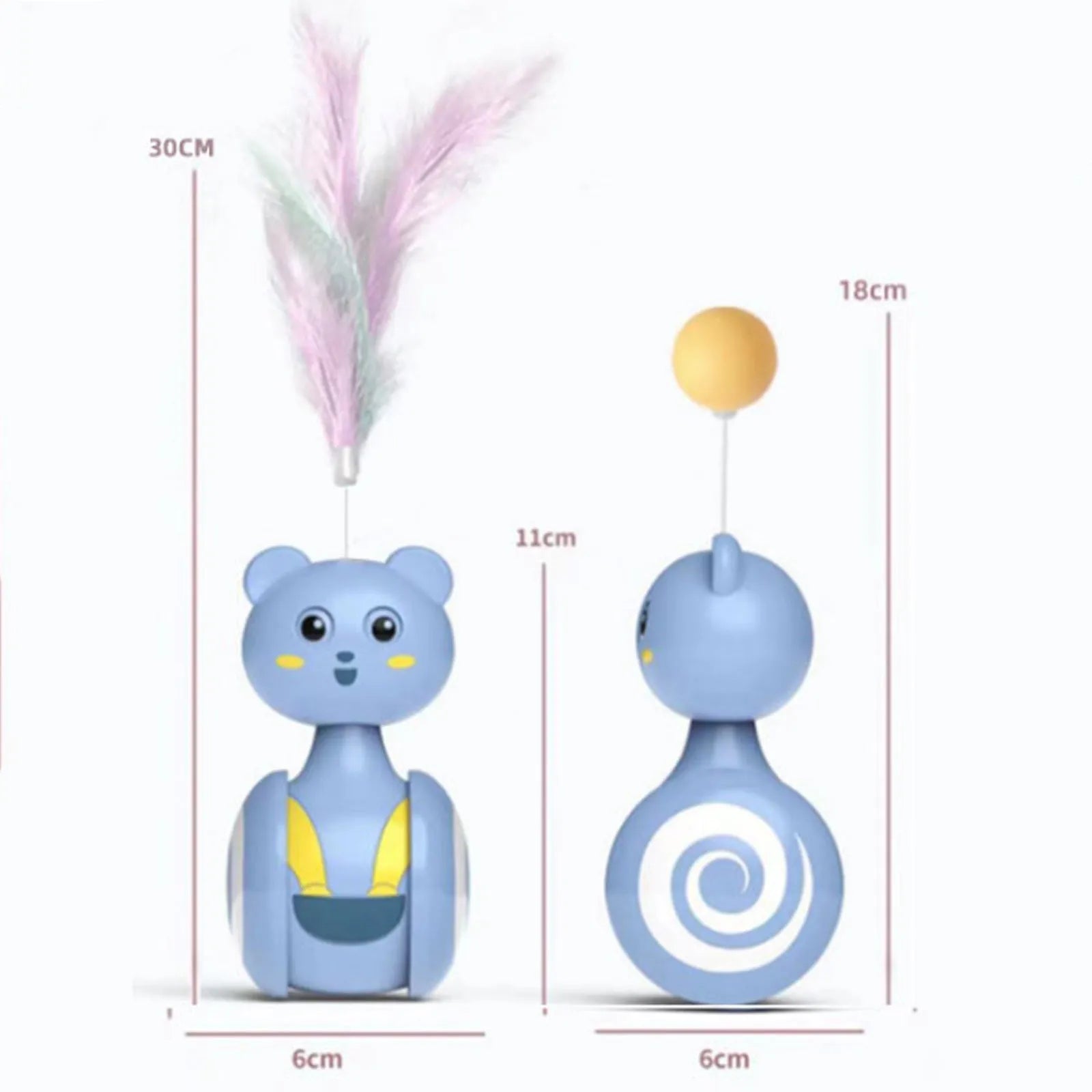 Pink and blue cat tumbler toys with feather lures and rolling balls on a wooden floor.