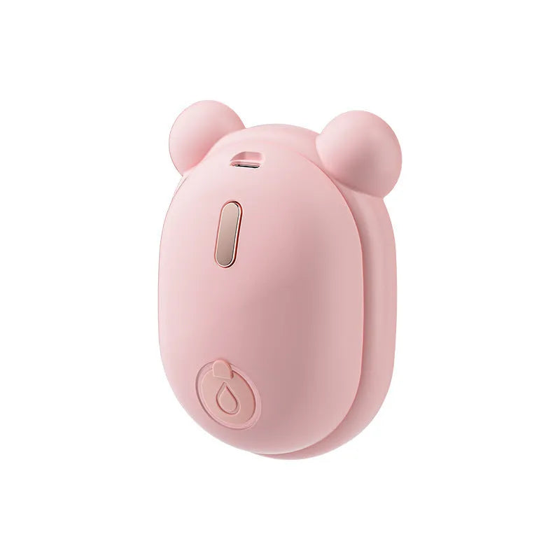 Pink rechargeable pet grooming brush with spray function and removable silicone comb head