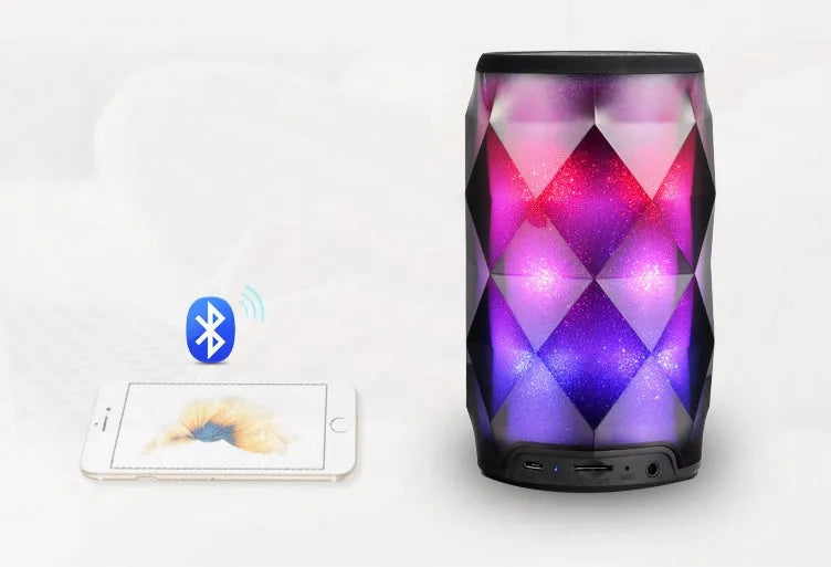 Black crystal diamond cut Coca-Cola can Bluetooth speaker lantern with colourful LED lights illuminated.