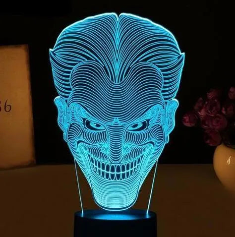 3D LED table lamp with acrylic base showing colourful gradient lighting, remote control, and USB cable