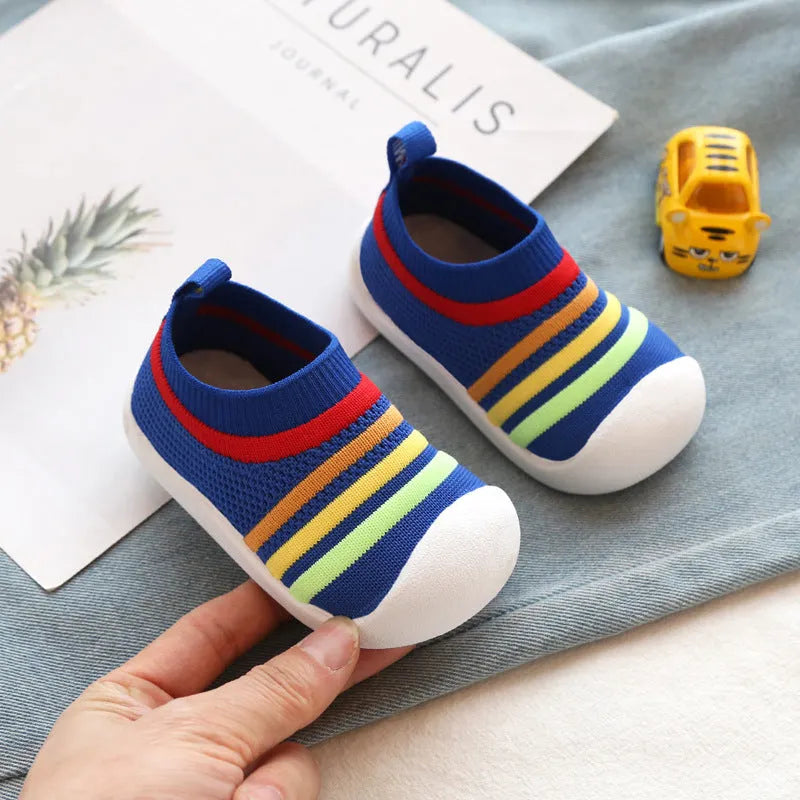 Children's flying knit sock shoes in blue with lace detailing and low-top design